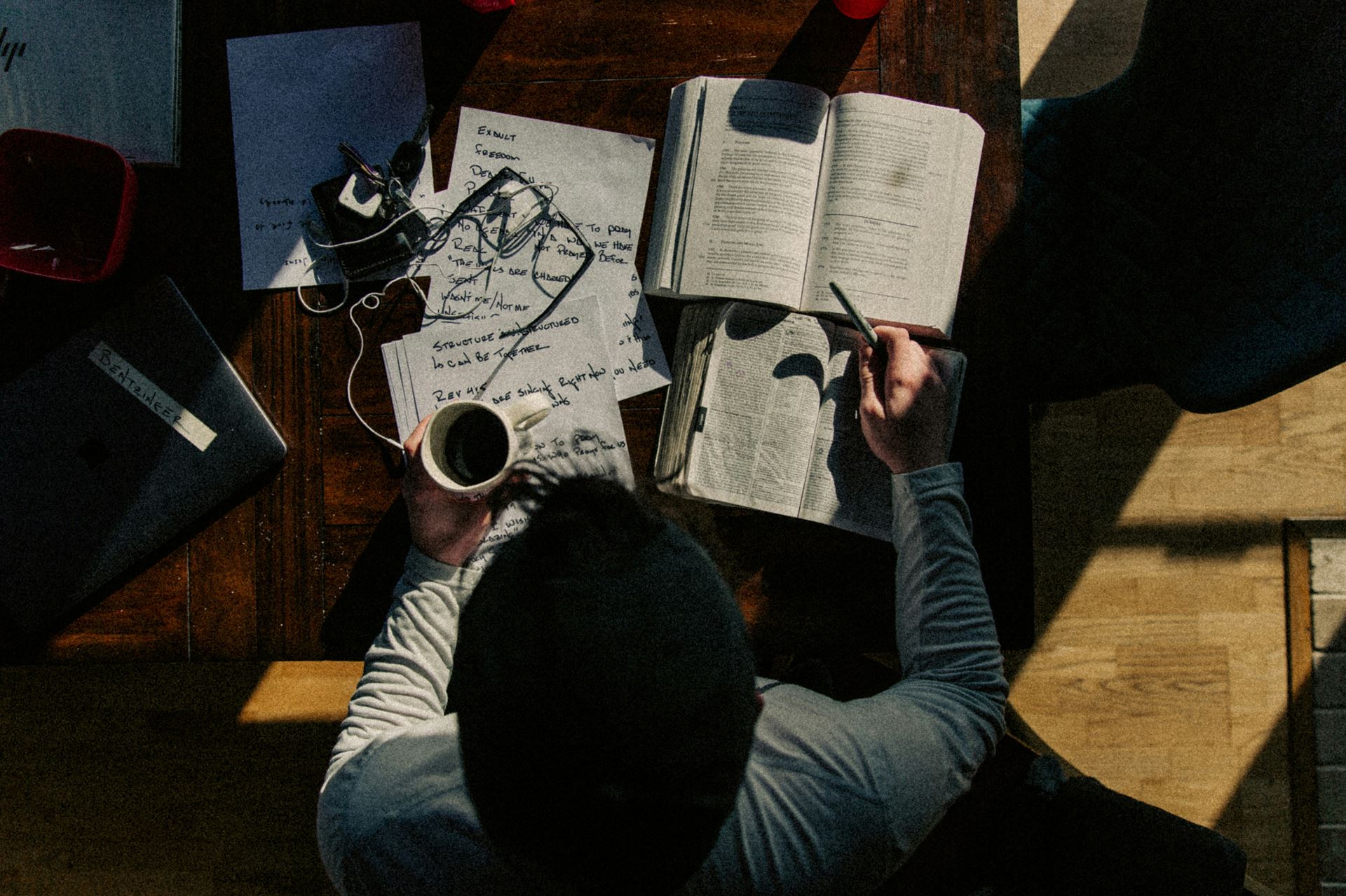  a man sitting on a table 